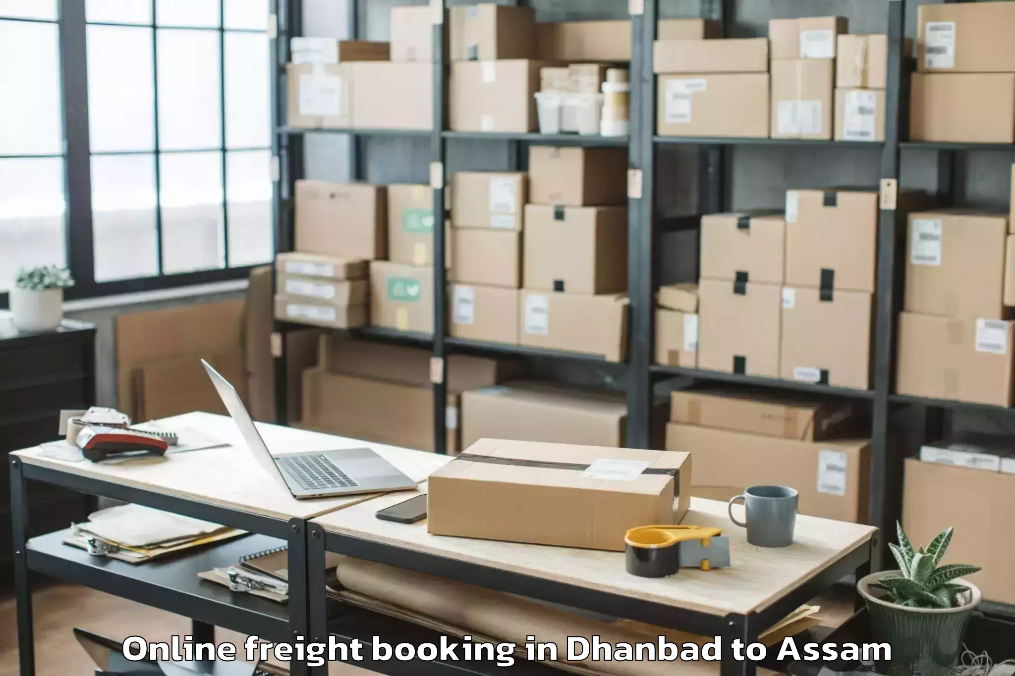 Easy Dhanbad to Laharighat Online Freight Booking Booking